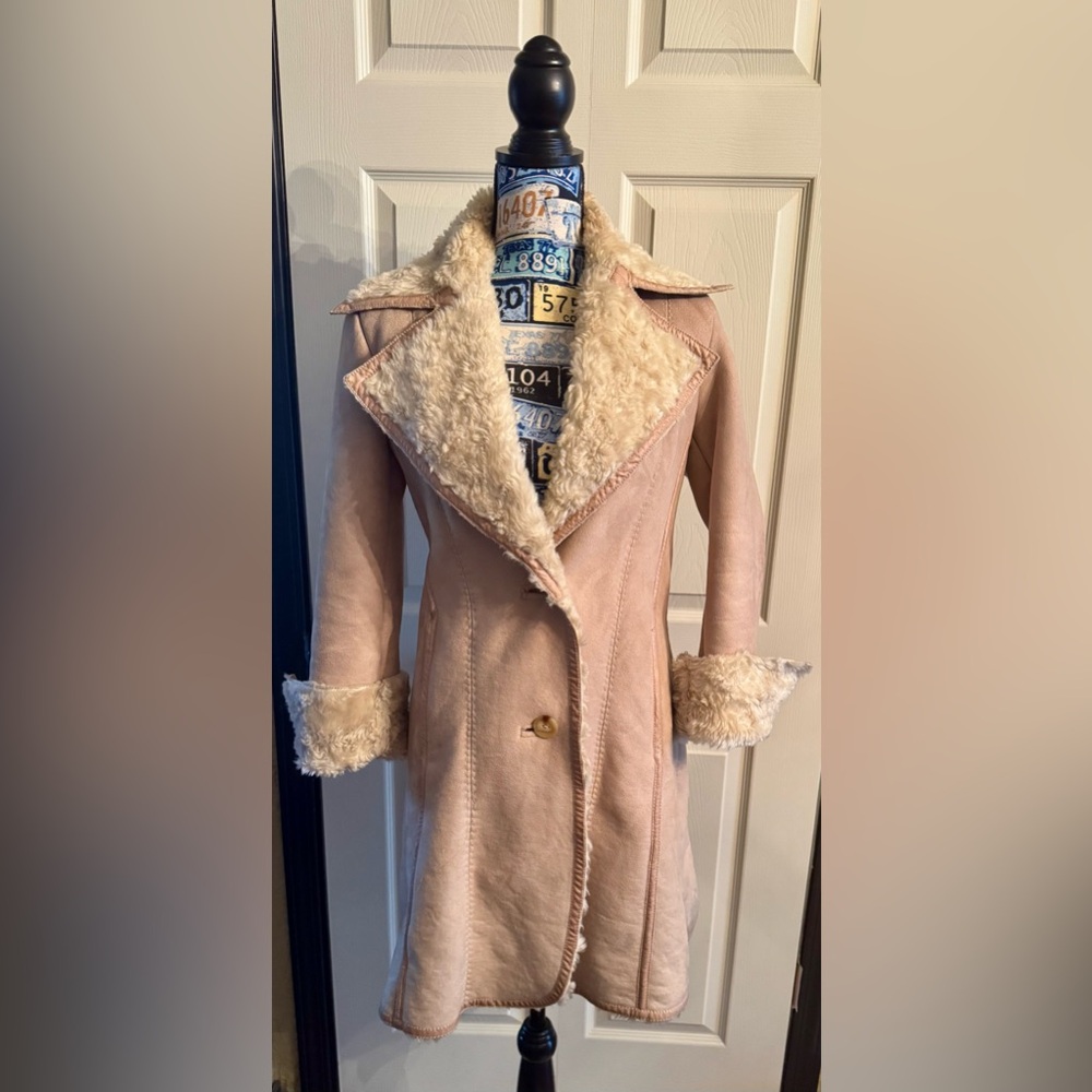 Ladies coat , faux fur lined.